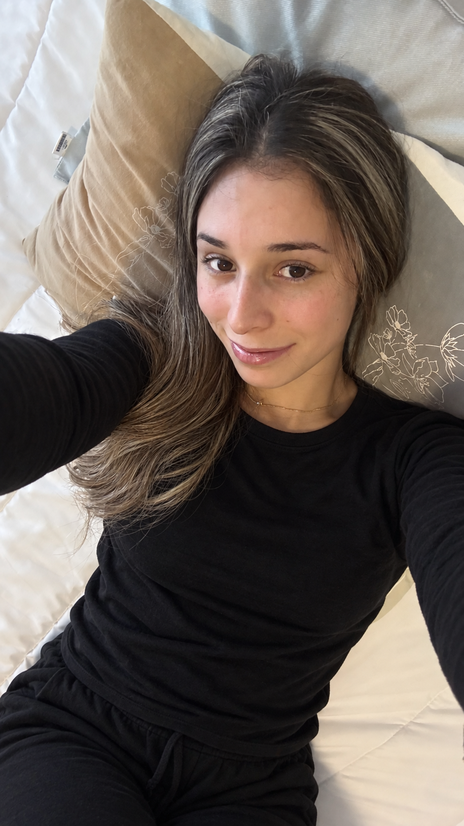 Ella relaxing in a black outfit